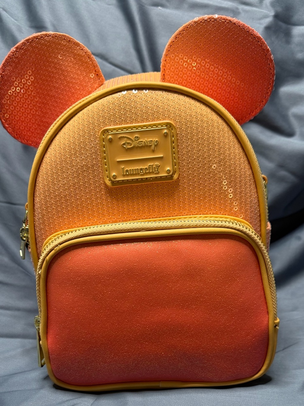 Loungefly Mickey mini backpack/convertible cross body.